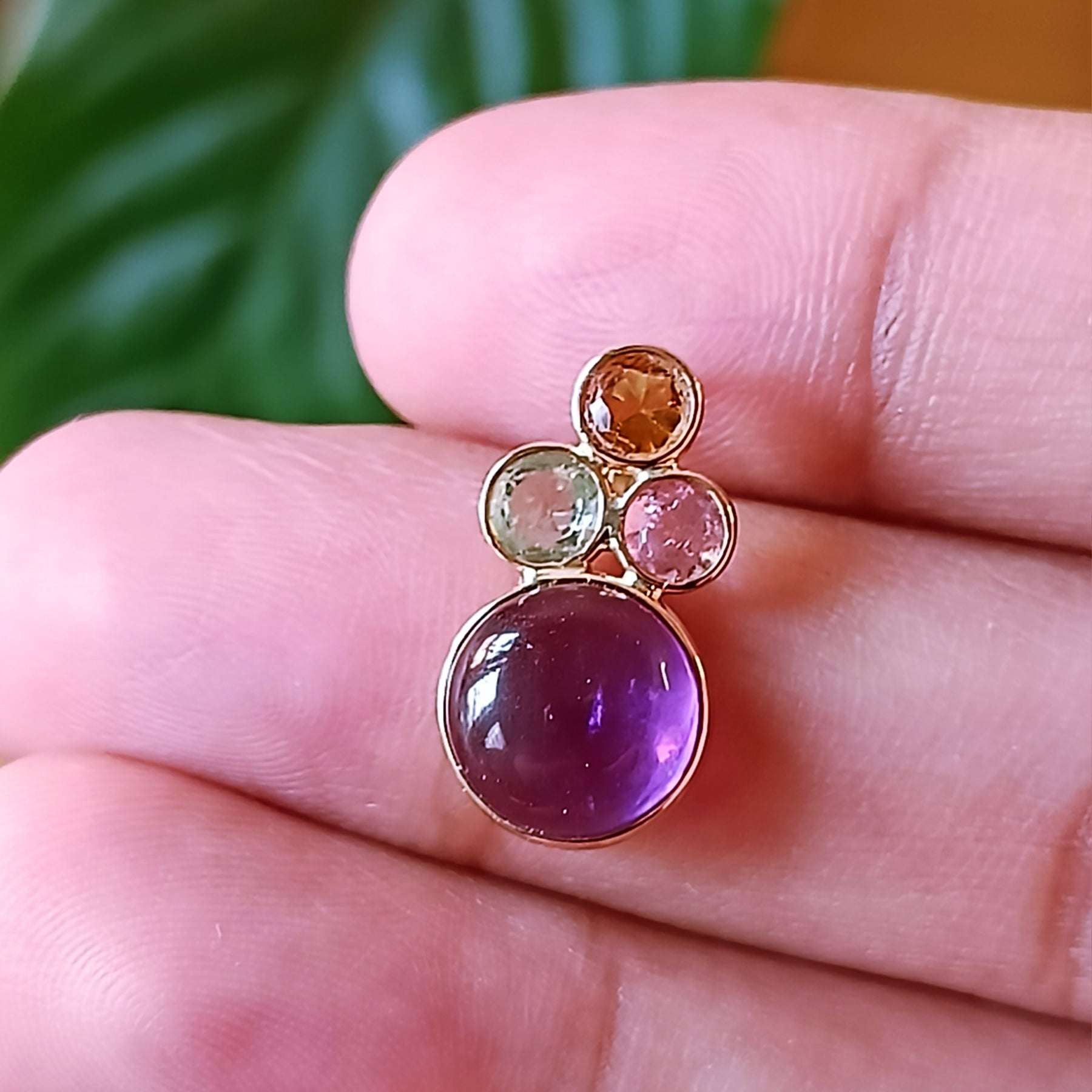 Twilight Spark Pendant – handcrafted gold and stone close-up